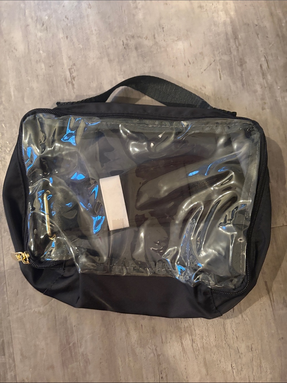 Clear-Front Black with Handle and strap inside.